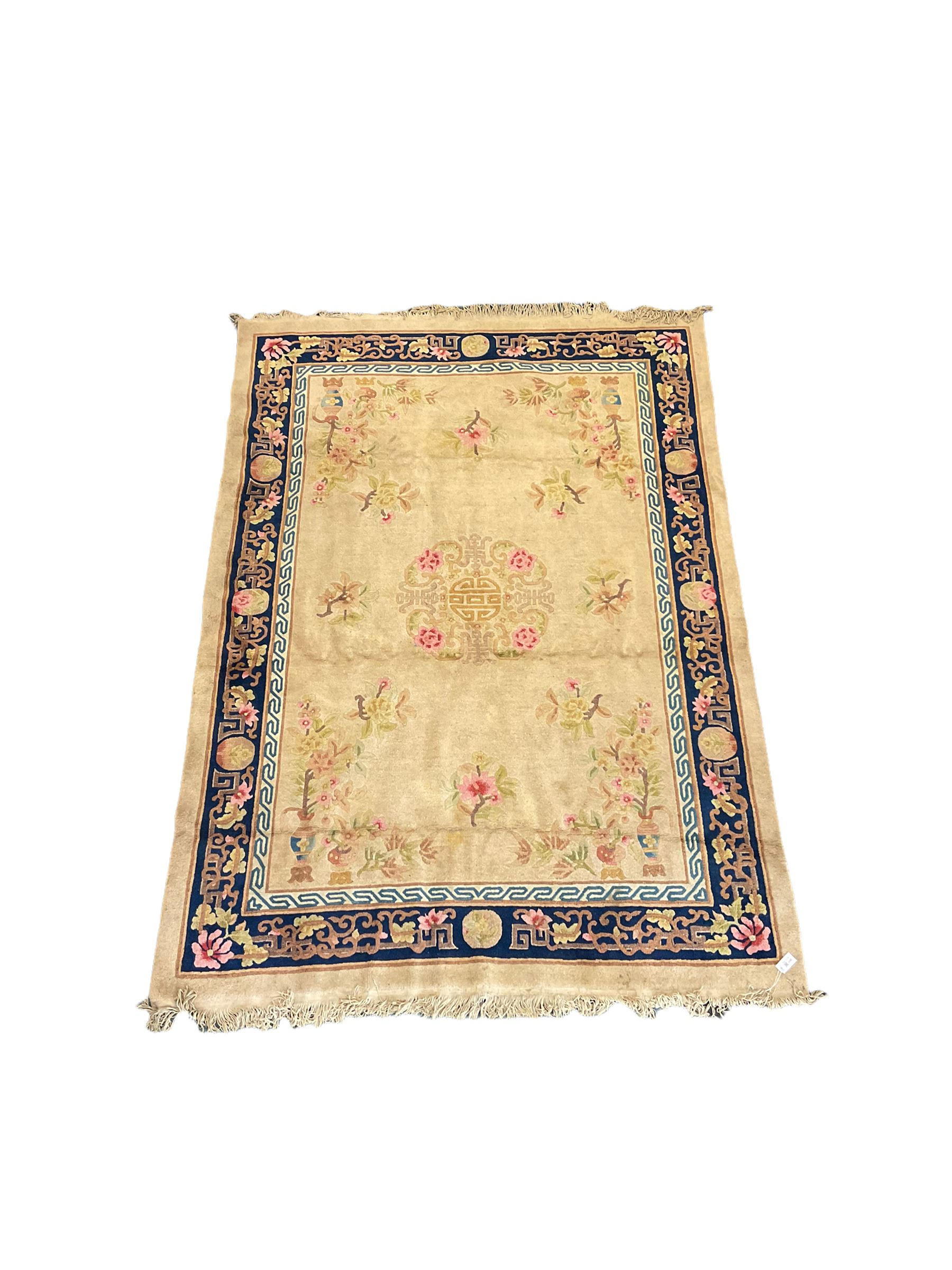 Chinese beige ground rug, blue border