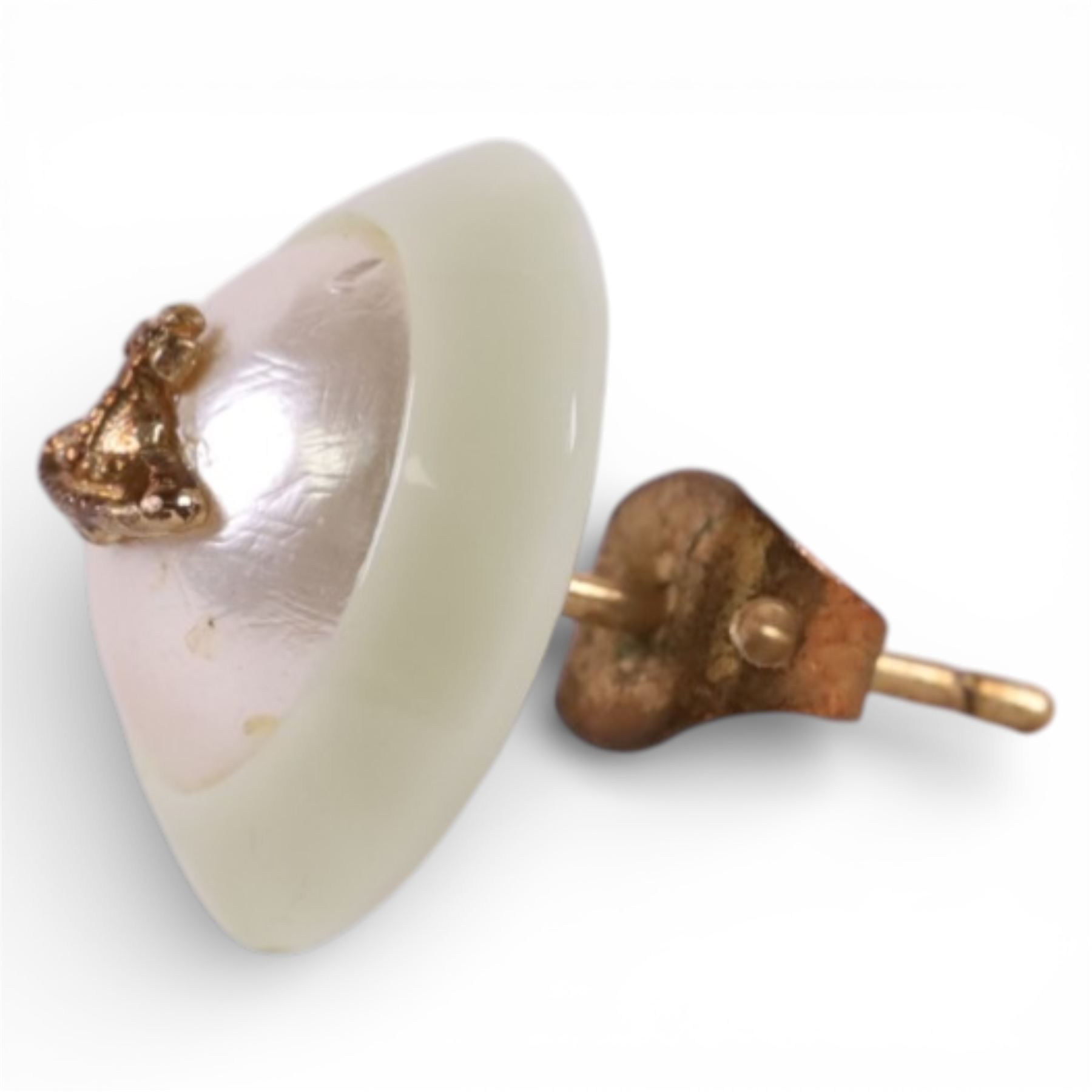 Pair of Vivienne Westwood stud earrings, with pouch