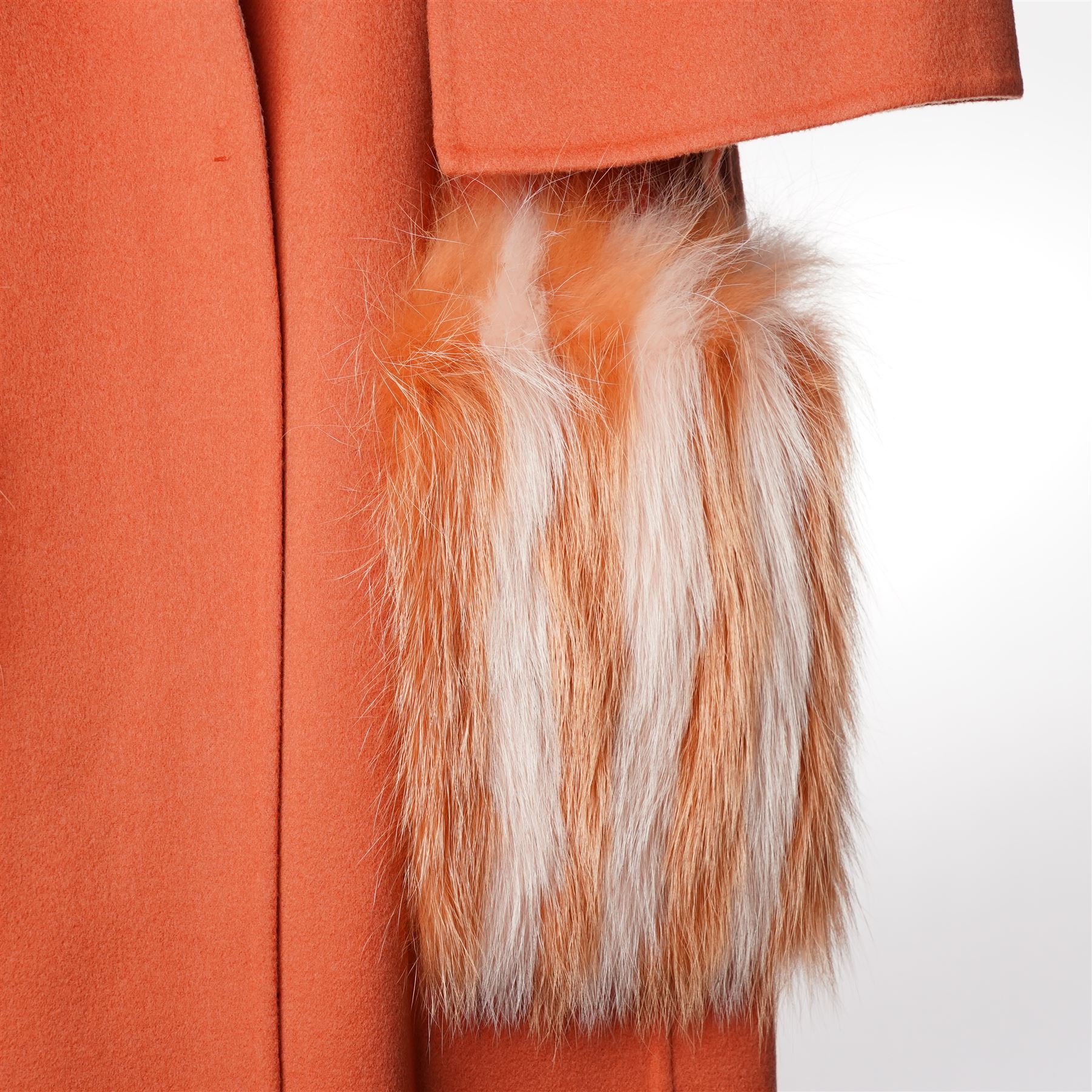 Fendi Roma - wool cape coat in 'Cayenne' orange peach, with concealed front fastening and short flared cape sleeves, applied with dyed arctic fox fur patch pockets, size 40, unused with original tags