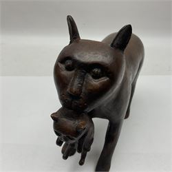 Folk Art wooden carving depicting a cat carrying a kitten, H16cm
