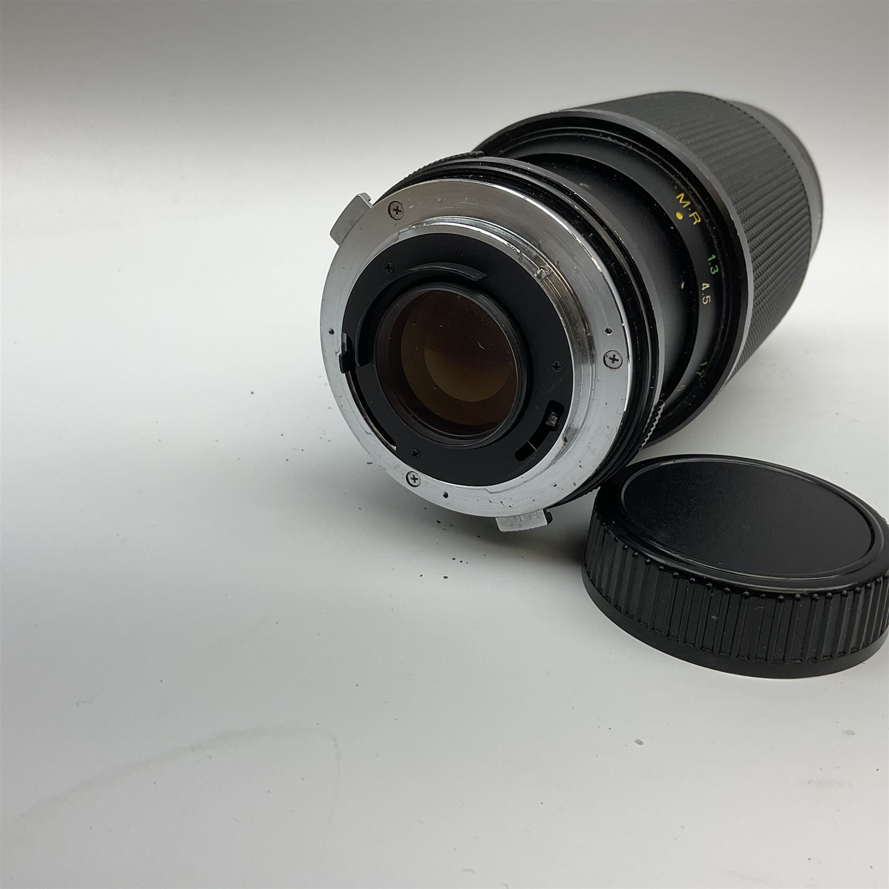 Olympus OM2 camera, 'no.264258', fitted with Olympus 'OM System G.Zuiko Auto-W 1:2.8 f35mm' lens and two other lenses, in a carry case