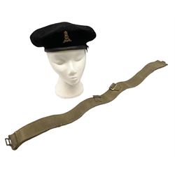 WW2 British black felt beret with Pioneer Corps cap badge, with Kangol Wear maker's mark dated 1943; and a British Army green webbing belt (2)
