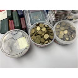 Quantity of Great British and World coins, including King George VI 1951 Festival of Britain crown coins in maroon or green card folders, two 1984 brilliant uncirculated coin collections in card folders, brass threepence pieces, sixpences, one shillings, two shillings, other pre-decimal coinage, Britain's first decimal coins sets in blue wallets, 1994 'Bank of England' two pound coin cover, Queen Elizabeth II United Kingdom and other commemorative crowns, pre Euro and other world coinage etc