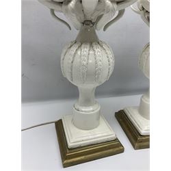 Pair of Casa Pupo white-glazed table lamps, modelled as a fruit upon a column of baluster form with foliate decoration, on a giltwood base, H62cm