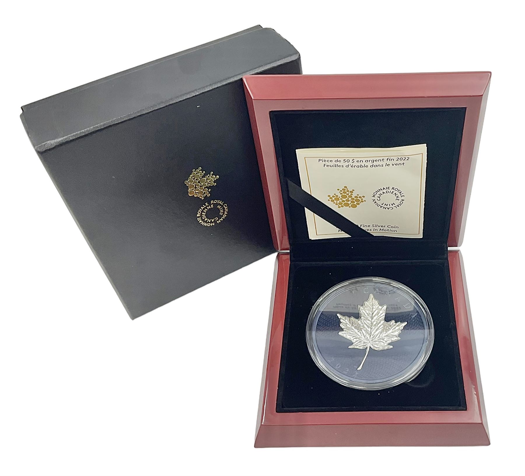 Royal Canadian Mint 2022 'Maple Leaves in Motion' fine silver fifty dollar coin, cased with certificate