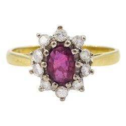 18ct gold oval ruby and round brilliant cut diamond cluster ring, London 1982