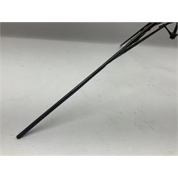 Victorian magician's cane, the mahogany walking stick twisting apart to reveal an internal mechanism, opening to tripod and black silk fold out magician's table, with horn handle and silver mount, hallmarked Birmingham 1891