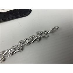 Maurice Lacroix gentlemans quartz wristwatch, 92127, with gold plated case, date apeture and leather strap, together with a Swarovski Crystal bracelet, two silver brooches and two costume brooches