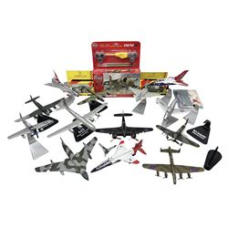 Thirteen unboxed Corgi Aviation Archive or similar die-cast models of aircraft, most with stands; Airfix 1:72 scale construction kit for BAe Harrier GR3; and two boxed Shell Collection die-cast models of cars