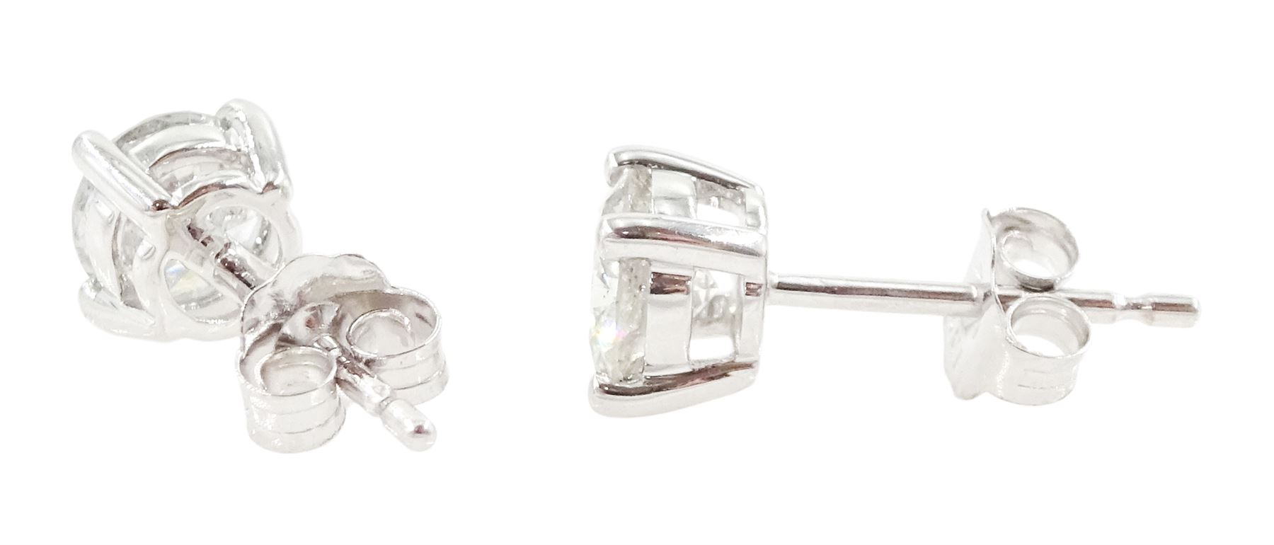 Pair of 18ct white gold round brilliant cut diamond stud earrings, stamped, total diamond weight approx 0.80 carat