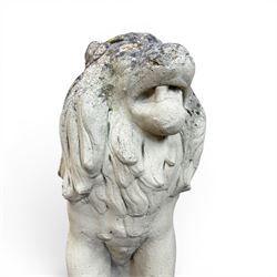 Pair of cast stone garden lions, seated on rectangular plinths