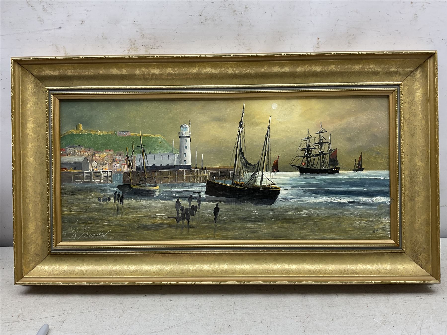 Robert Sheader (British 20th century): Scarborough South Bay at Low and High Tide, pair oils on board signed 21cm x 49cm (2)