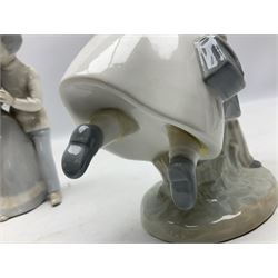 Three Nao figures comprising The Next Dance 1201 and Girls First Communion 0236, and young girl wearing a hat, together with two further Spanish style figures