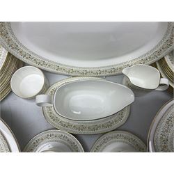 Royal Doulton Paisley pattern tea and dinner service for twelve, comprising dinner plates, side plates, soup bowls, dessert bowls, tea plates, two lidded tureens, sauce boat and saucer, sucrier and jug, oval serving dish and teacups and saucers