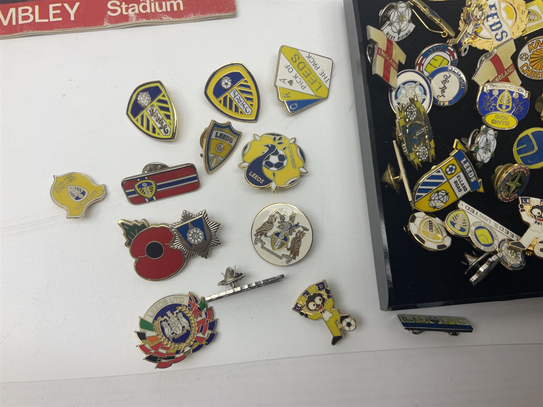 Leeds United football club - football association challenge cup competition final Saturday 11th April 1970 Chelsea vs Leeds United at Wembley programme, football association charity shield Saturday 10th August 1974 Leeds United vs Liverpool programme, various supporters pin badges, scarf for the league 1 playoff final Wembley stadium 25th May 2008, Danbury Mint 'Great Moments in the History of Leeds United' leather bound collectors edition, various used home game tickets etc