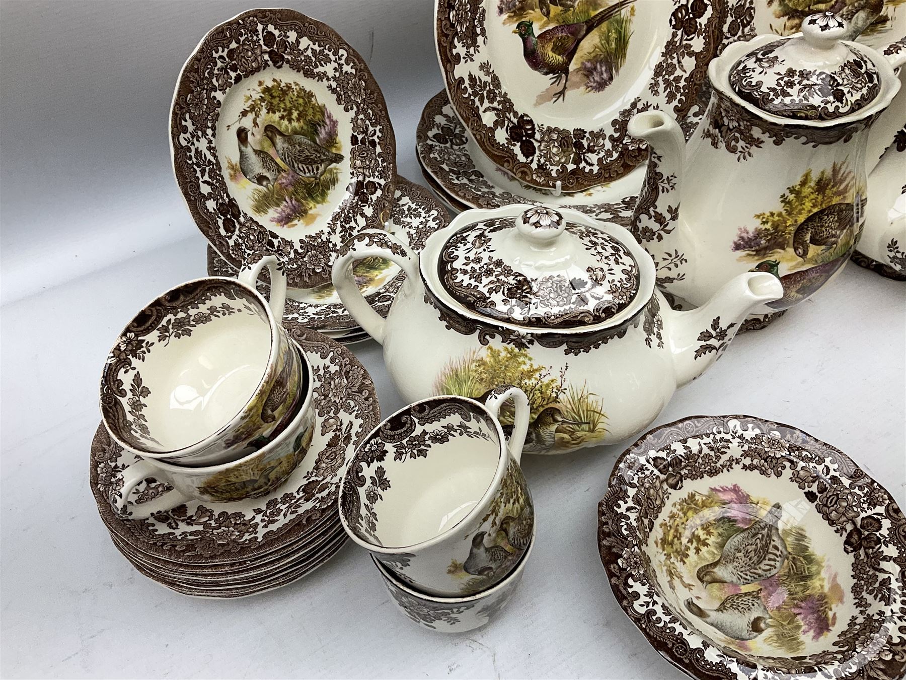 Royal Worcester Palissy Game Series pattern tea and dinner wares, to include two teapots, coffee pot, twelve cups and saucers in two sizes, four dinner plates etc (40) 