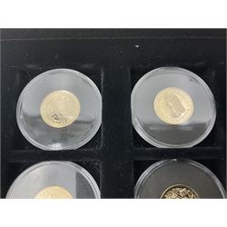 Sixteen hallmarked 9ct gold replica coins from 'The Historic Coins Of Great Britain Museum Gold Collection', housed in a Westminster display case, overall weight approximately 51.3 grams