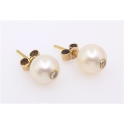  Pair of pearl gold stud ear-rings each set with a single diamond, hallmarked 18ct  