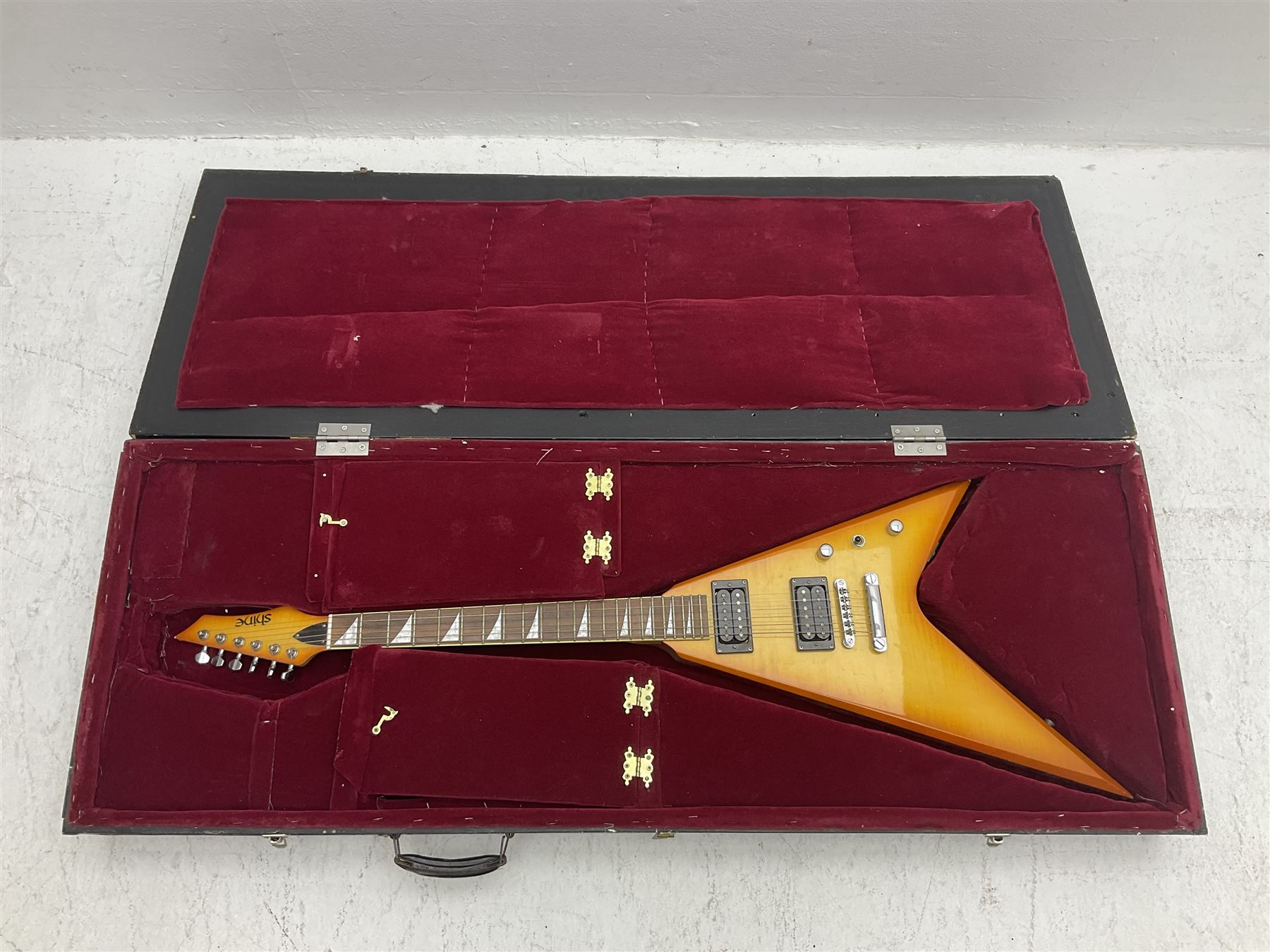 Shine offset V-shaped six string electric guitar, in fitted case