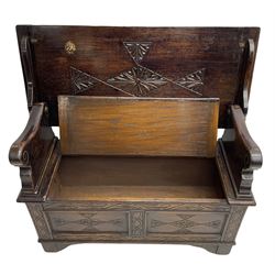 17th century design stained oak monks bench, hinged metaphoric table back, over hinged box seat compartment, the panelled front carved with foliate decoration and lozenges