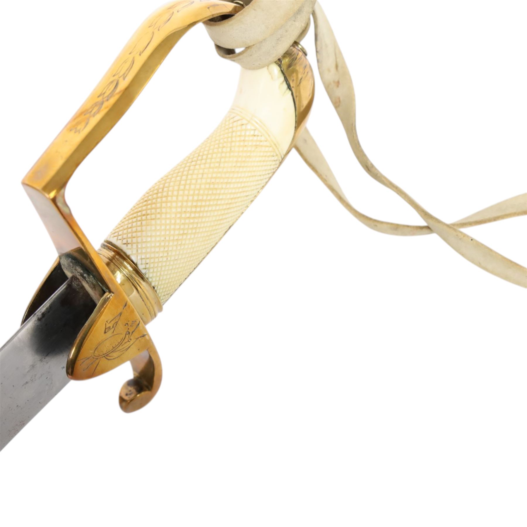British 1976 pattern cavalry officers' saber variation of  private purchase, the 76cm single edged blade extremely curved, brass stirrup hilt with chequered ivory grip the languets bearing military trophies, with original buck skin sword knot, the leather scabbard has three brass mounts with twin suspension rings, the top mount bears makers cartouche of 'Tatham to his Majesty, Charing Cross London', 1800-1860, overall L90cm  This item has been registered for sale under Section 10 of the APHA Ivory Act 