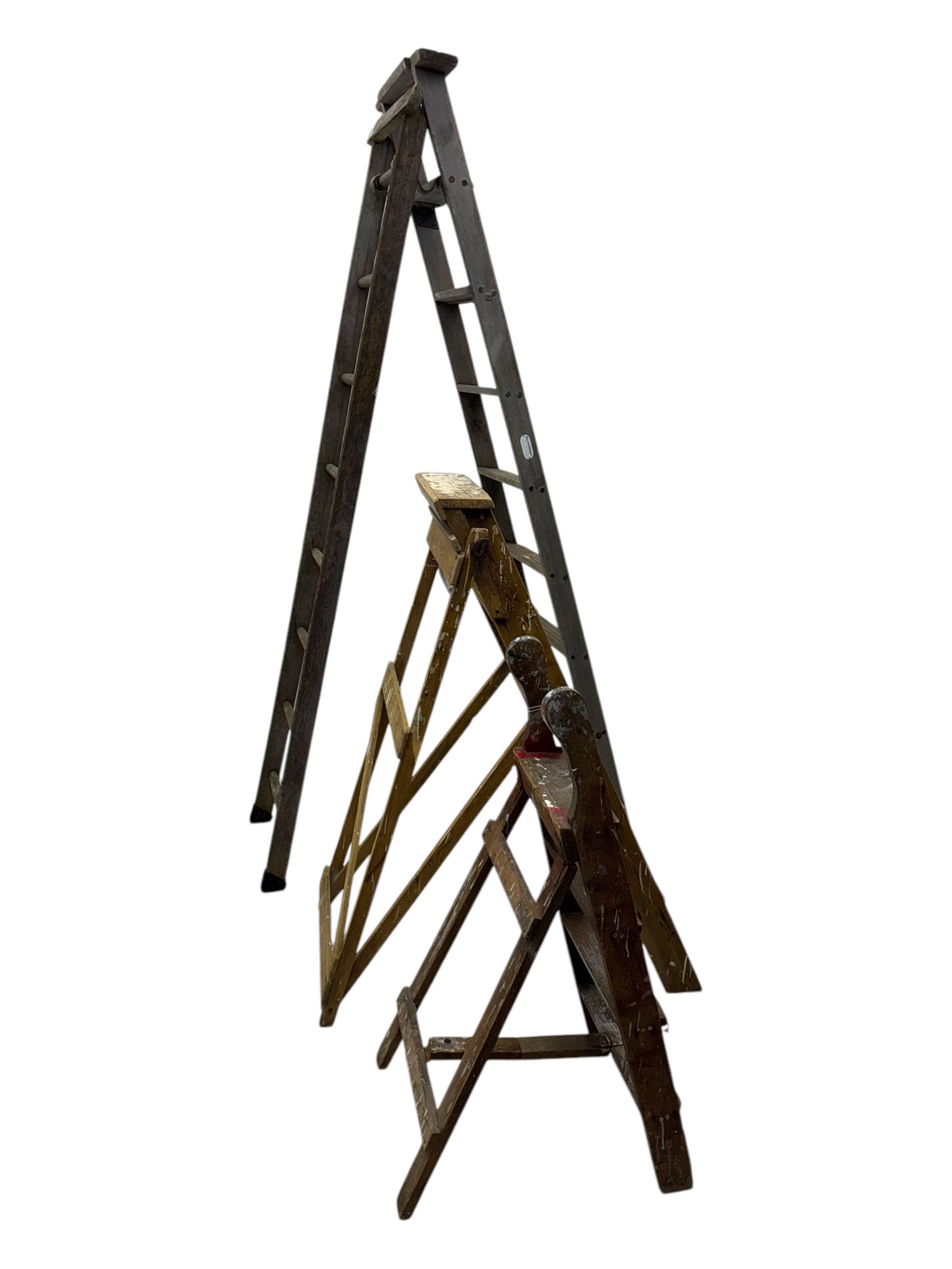 Slingsby - large pair of wooden ladders; G A Jones's - wooden steps; and a small wooden step ladder (3)
