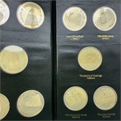 Limited Edition Danbury Mint 'History of the English Speaking Peoples' complete set of fifty silver medallions, each depicting historical figures and scenes from Julius Caesar Lands 55BC to Second World War 1939AD, contained within leatherette folder with personalised presentation to cover and interior, no. 2780/7500