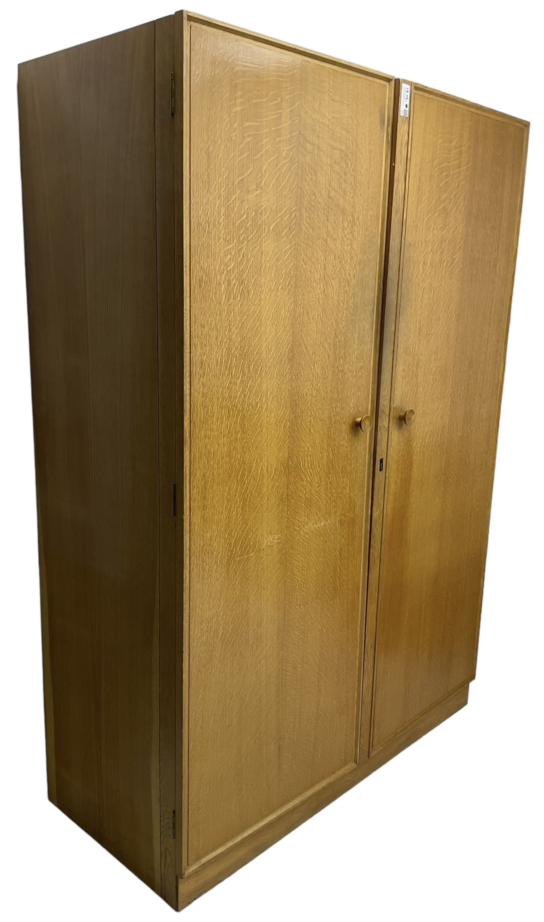 Meredew - mid-20th century oak single wardrobe (W61cm, H153cm, D46cm); and matching double wardrobe (W122cm, H176cm, D54cm)