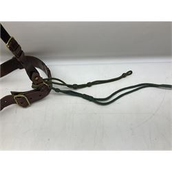 British Army Officers Sam Browne leather belt with shoulder strap; and webbing belt with Potter London Staybrite buckle for 19th Regiment of Foot (Green Howards) with various markings (2)