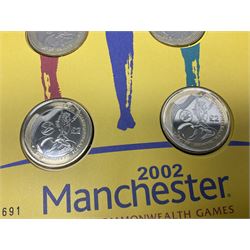 The Royal Mint Queen Elizabeth II 2002 Manchester Commonwealth Games four coin two pound coin cover