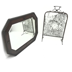 Early 20th century oak mirror with bevel edged glass (W82cm, H57cm) and an arts and crafts style fire screen
