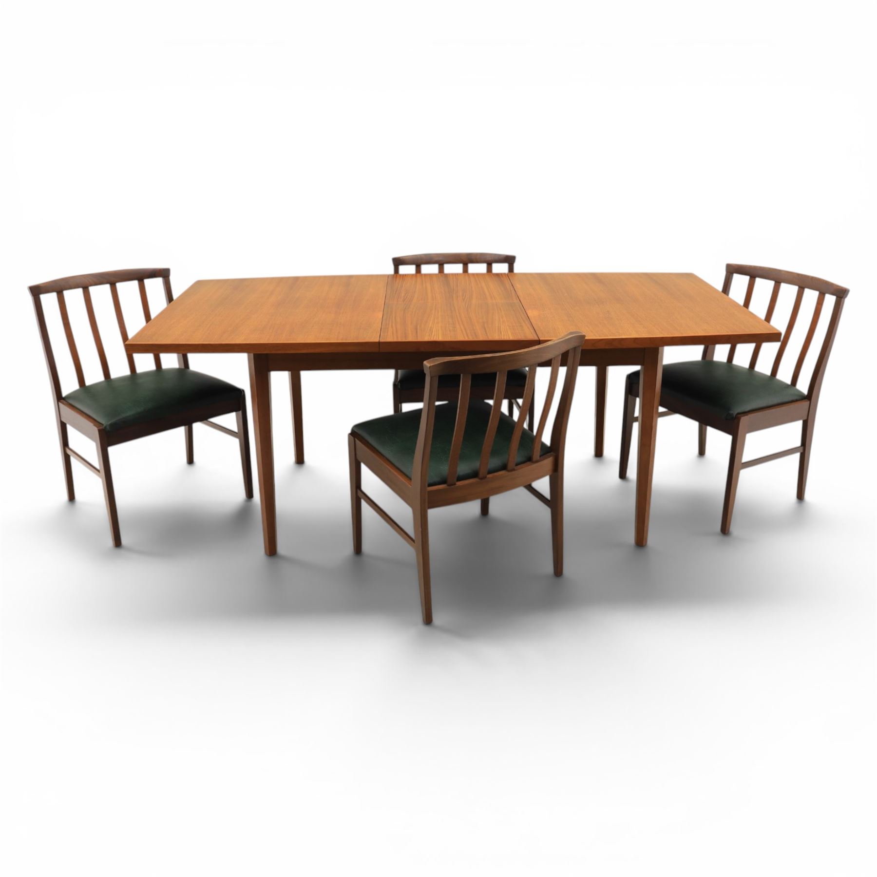 Mid-20th century teak dining table and chairs, with stowable fold over leaf, raised on square tapering legs, the chairs with teak frames and reupholstered green leather seats