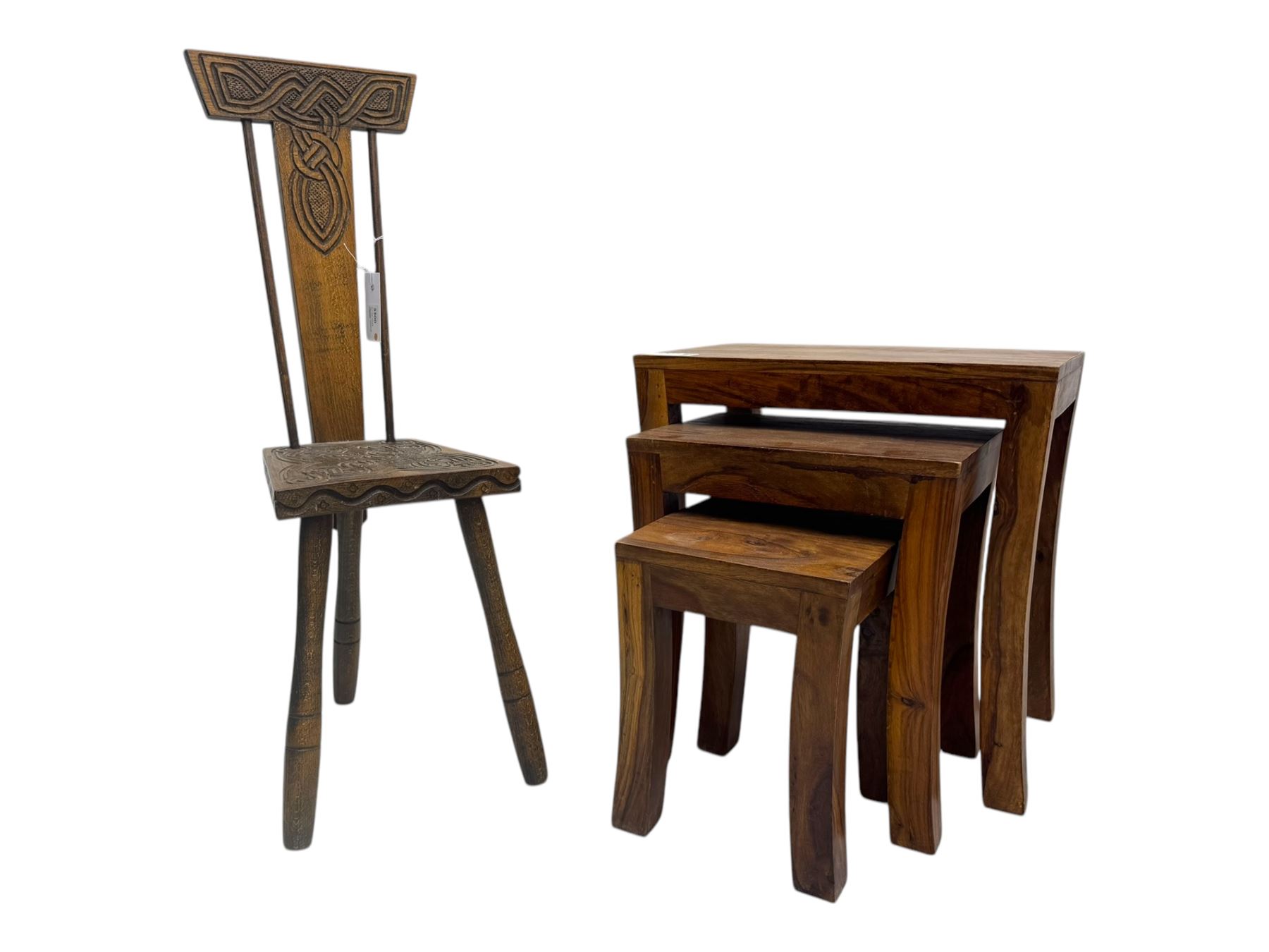 Early 20th century Celtic-design carved oak hall chair, decorated with carved interlacing knot motifs, raised on three splayed supports (W24cm, D26cm, H79cm); nest of three hardwood tables, rectangular tops raised on curved and splayed supports (W45cm, D30cm, H46cm) 