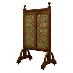  Arts & Crafts oak framed fire screen, two glazed doors enlcosing floral tapestry panel, on arched supports with castors, W62cm, H109cm, D38cm  