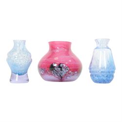 Four Caithness perfume bottles, together with seven Caithness vases 