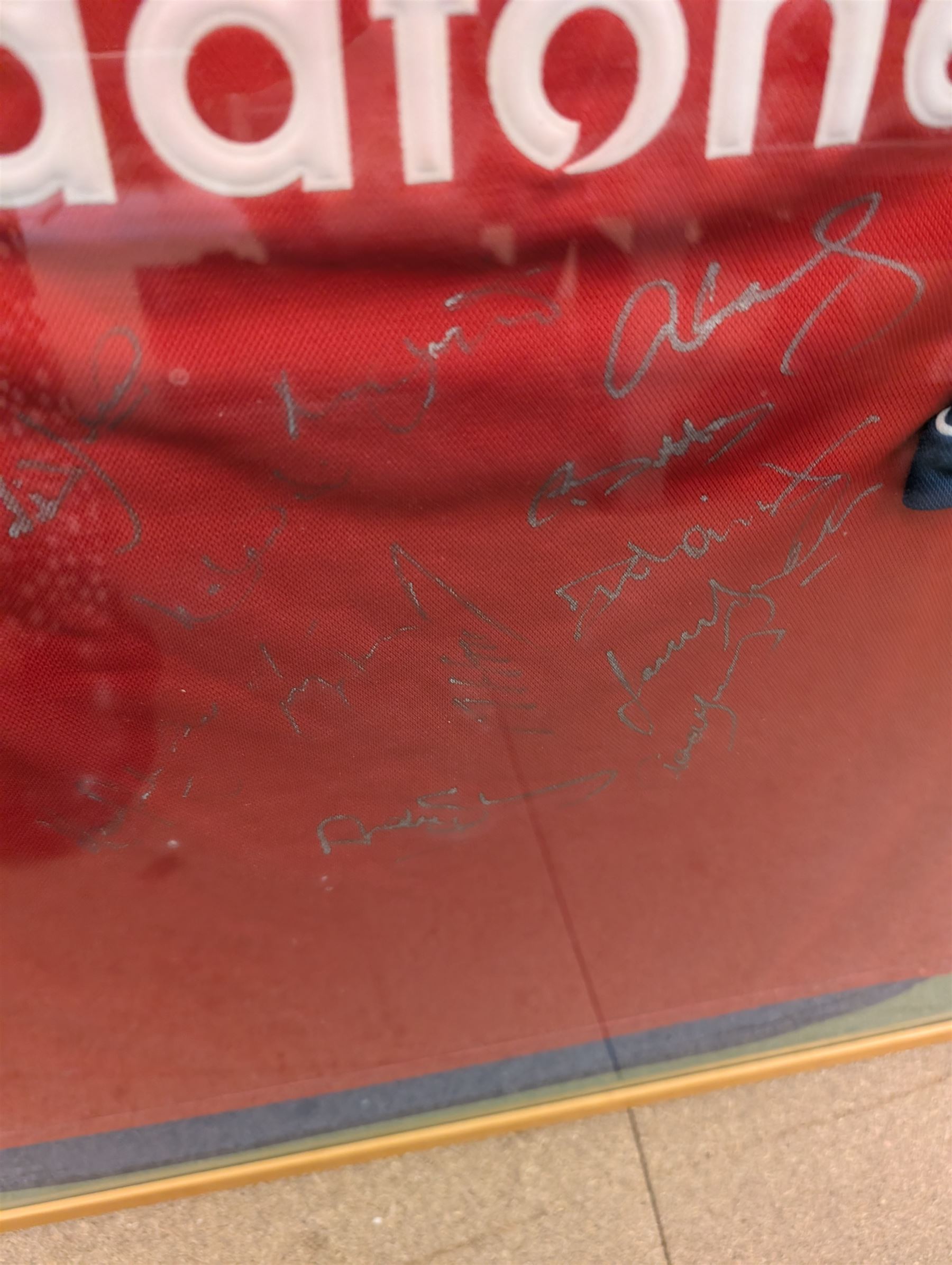 Cricket memorabilia: signed cricket bat from John Childs Benefit year 1994, and two framed England cricket shirts both with signatures, largest frame H95cm