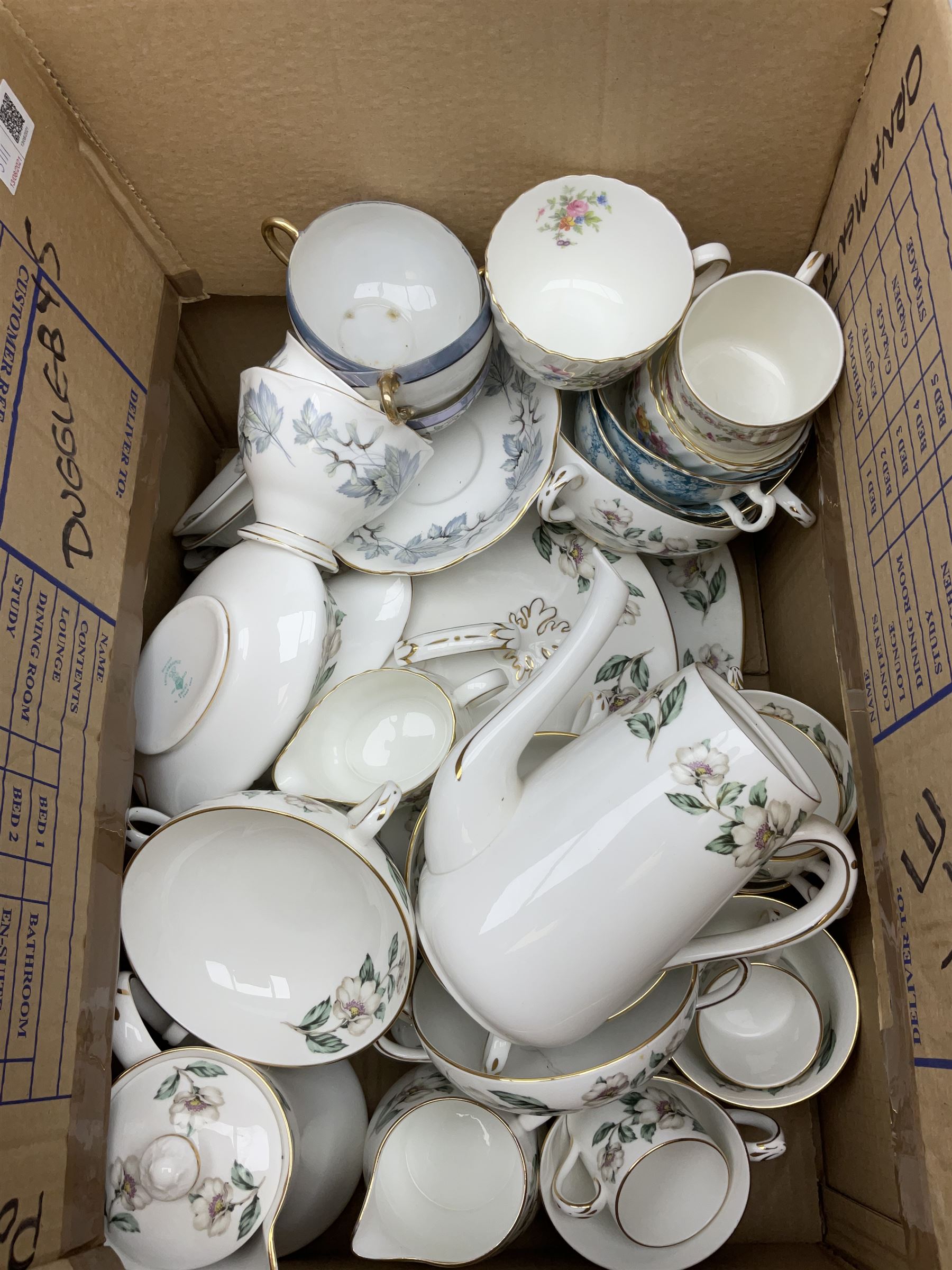 Collection of tea and dinner wares, including an extensive set of 'Christmas Rose' Crown Staffordshire, including tea and coffee wares and two lidded tureens, a blue and white decorated set of cups and saucers, cake stand etc, three boxes . 