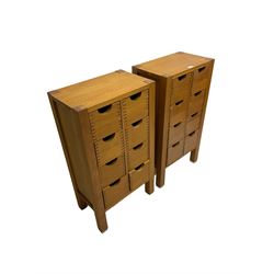 Pair oak CD cabinets, fitted with eight drawers and panelled sides