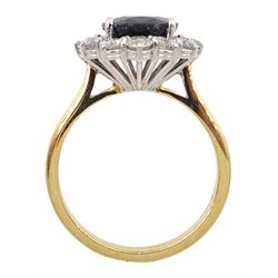18ct gold sapphire and round brilliant cut diamond cluster ring, hallmarked, sapphire approx 3.85 carat, total diamond weight approx 0.90 carat
