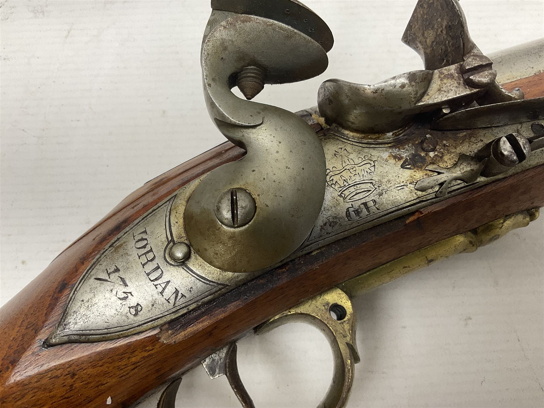 Brown Bess style 10-bore flintlock musket, the action marked with Crowned GR, 'Jordan' and dated 1758, the 104cm(41