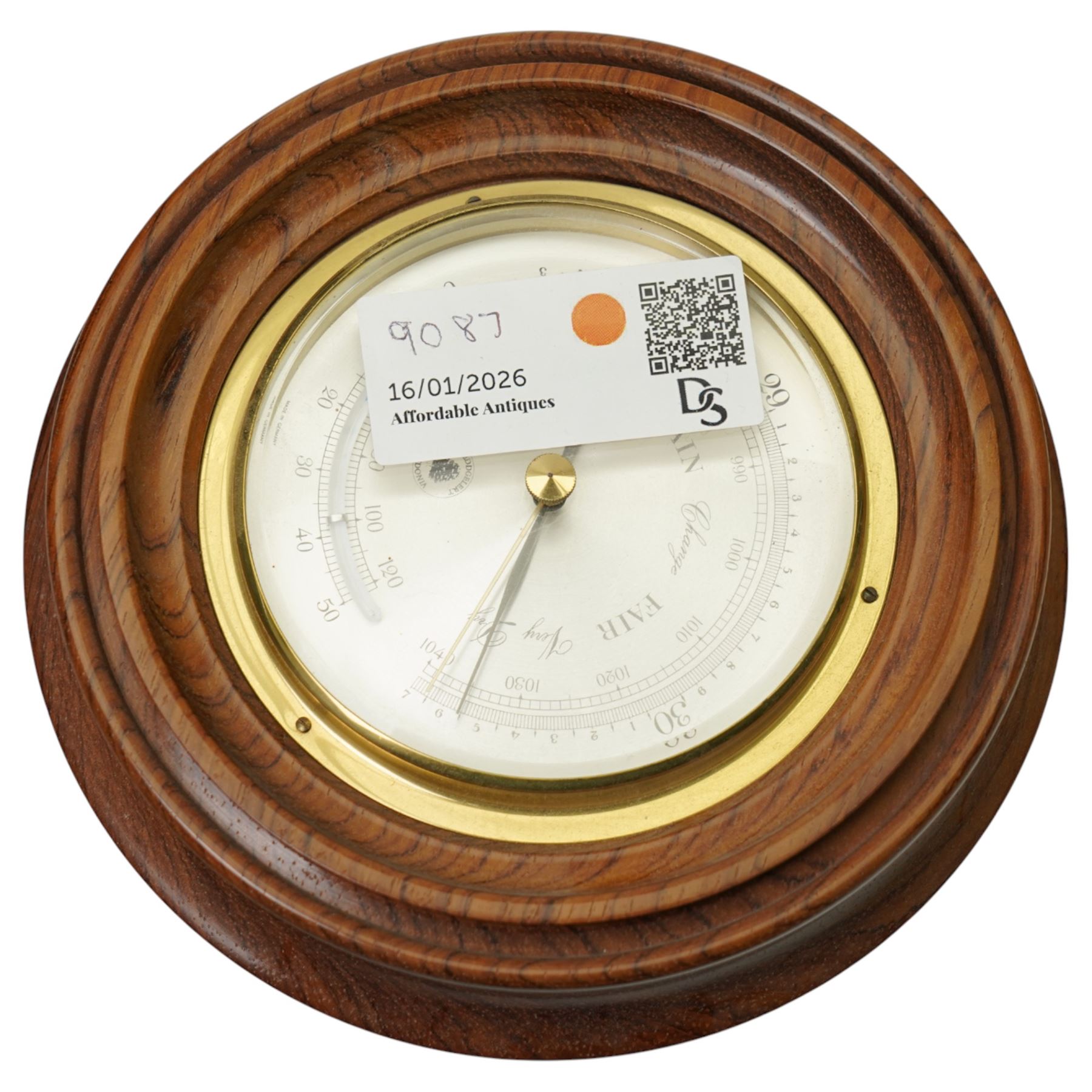 American-early 20th century drop dial wall clock with a 20th century quartz wall clock and small aneroid barometer.  
