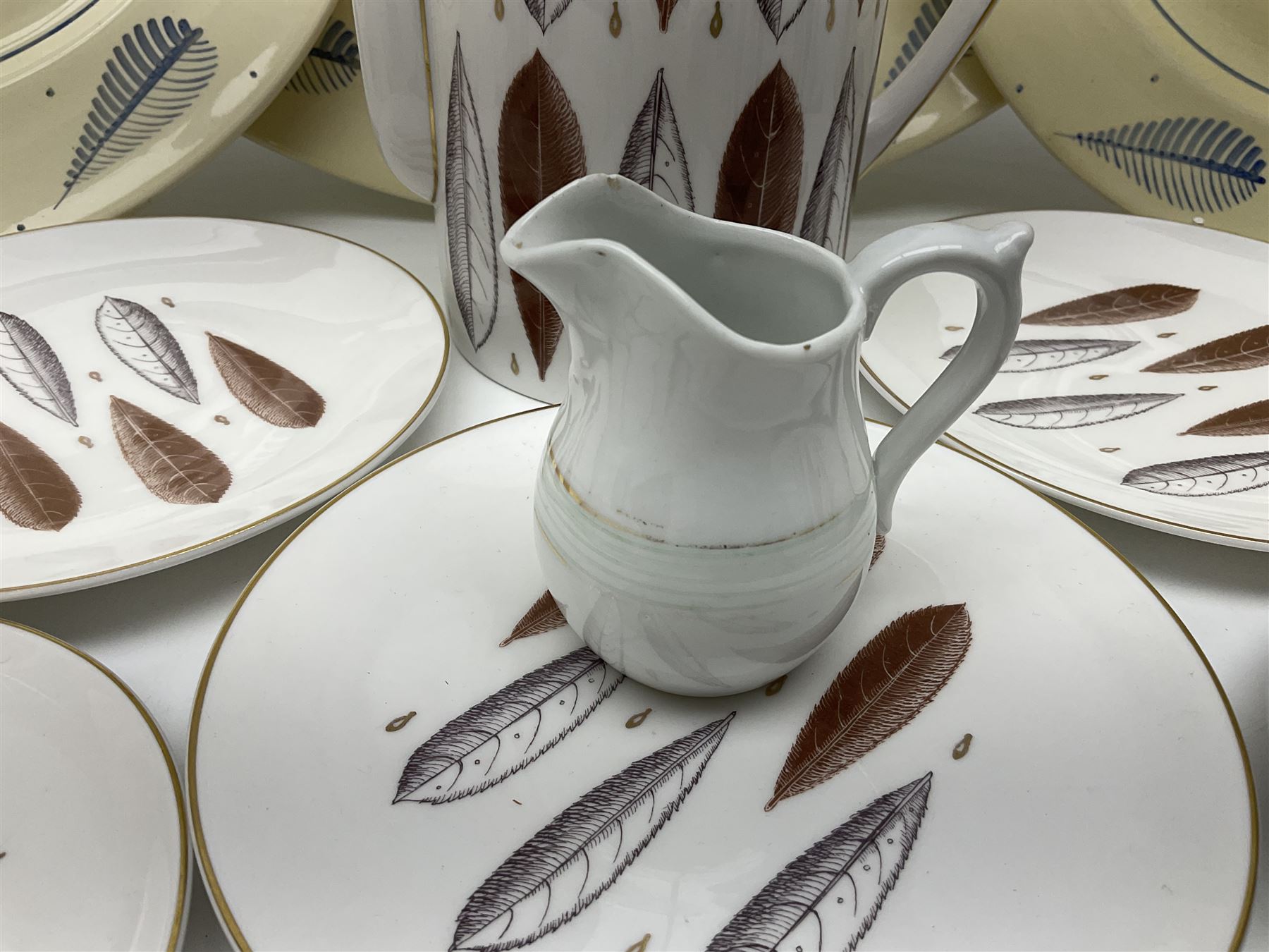 Susie Cooper Hyde Park pattern coffee set, comprising coffee pot, four coffee cans and saucers, dessert plates, together with three plates in a similar design 