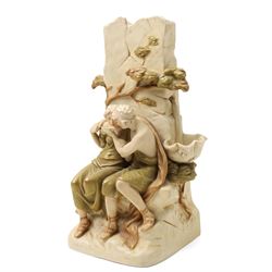 Royal Dux figure of seated male and female figures drinking by a well with gilded decoration H37cm