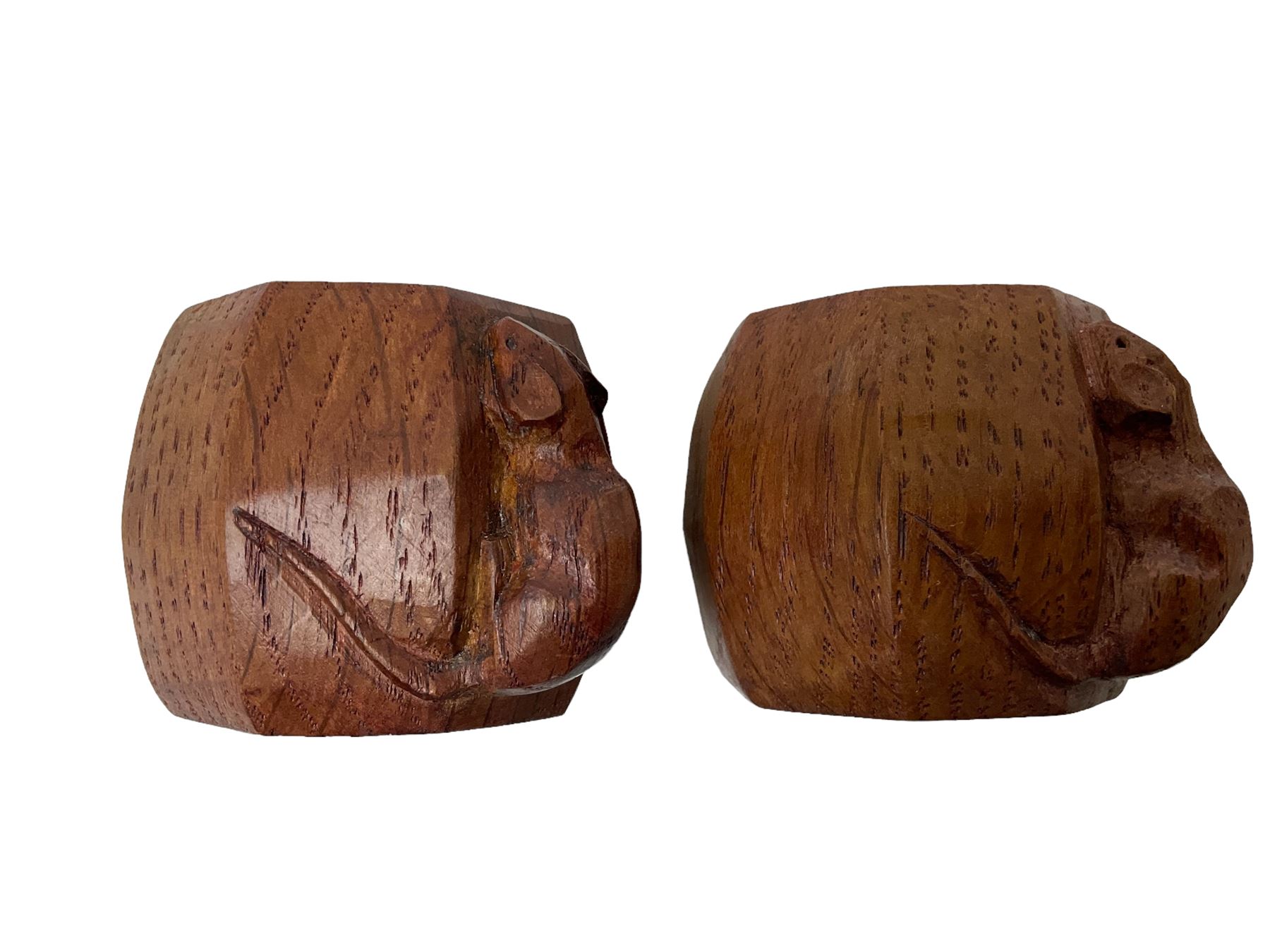 Mouseman - pair of oak napkin rings, of bulbous octagonal form each carved with mouse signature, by the workshop of Robert Thompson, Kilburn, L4cm W6cm