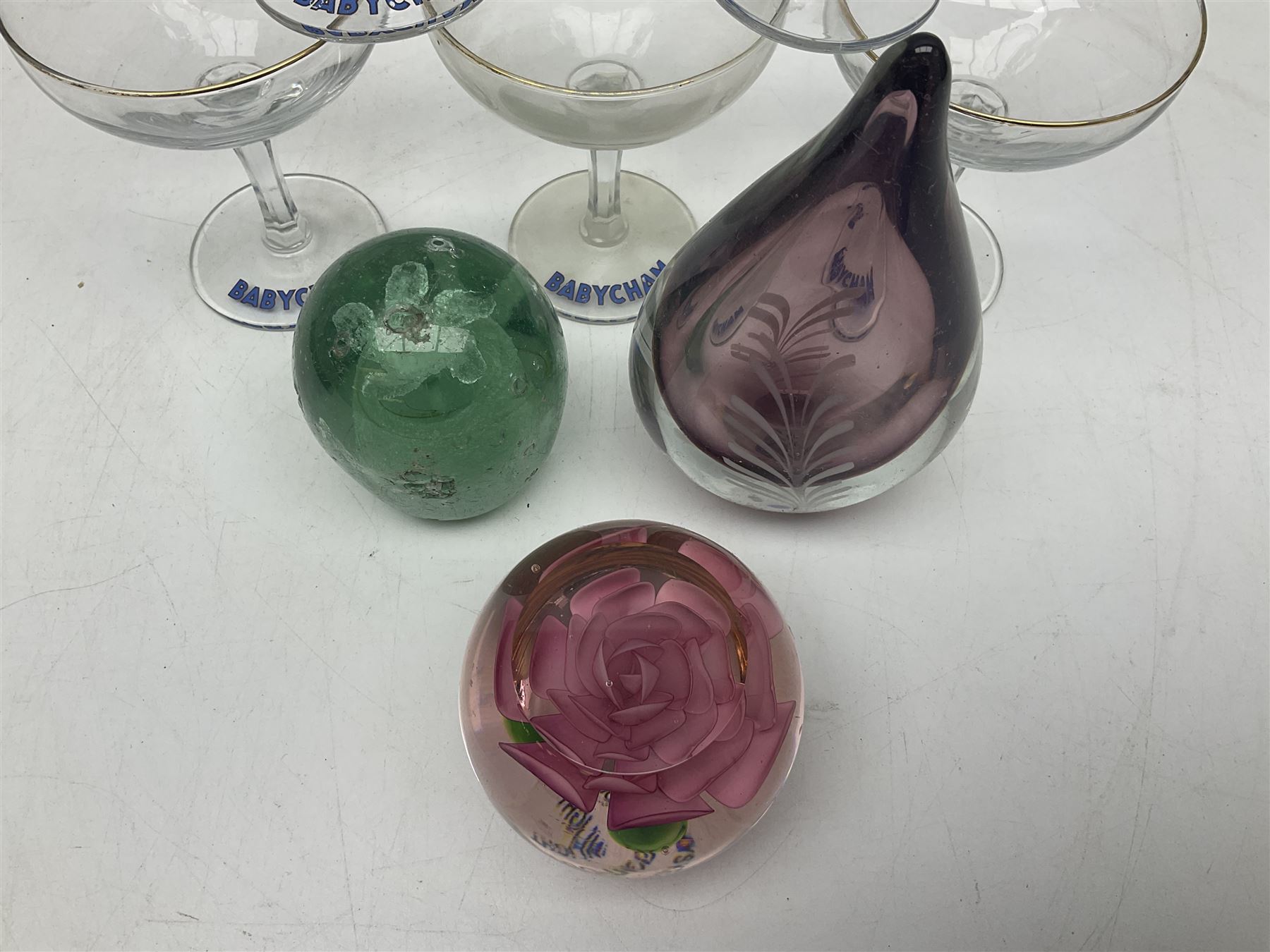 Five Babycham glasses, together with five paperweights, to include examples from Liskeard glass etc