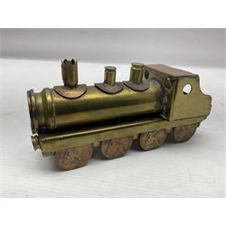 Trench Art - WWI 0-8-0 steam locomotive made from brass, copper and late Victorian pennies and half-pennies L17.5cm; WWI brass and copper tank candleholder; WWI brass shell case two-handled vase inscribed 'RFA France 1914-17'; and an unrelated brass plant holder (4)