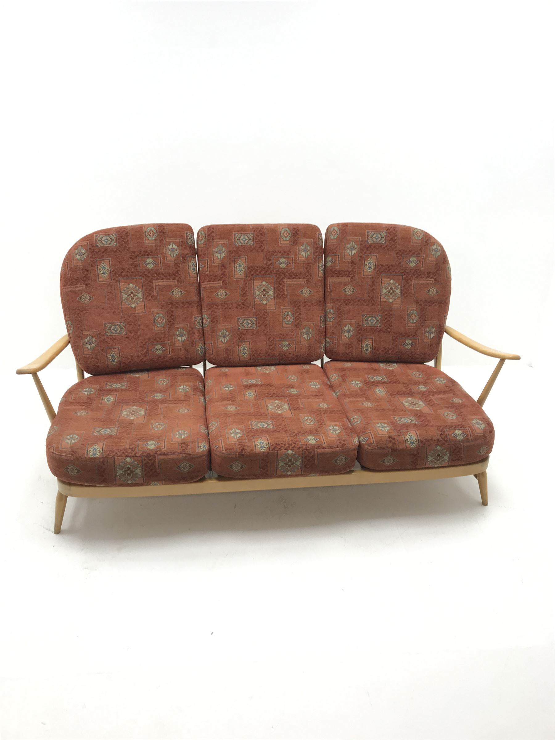 Ercol three seat Windsor sofa with loose cushions, spindle back, turned supports