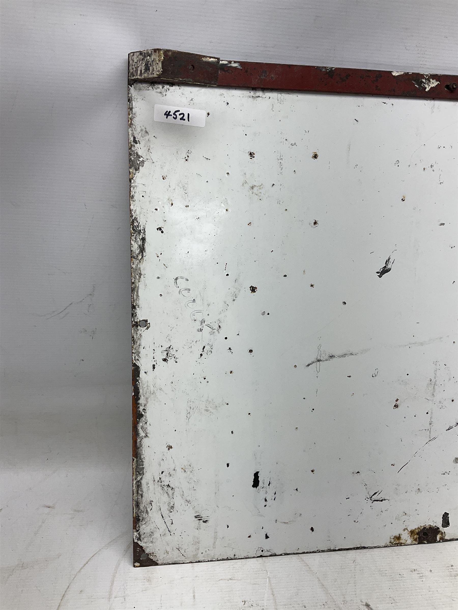 Enamel station sign for Charing Cross in red and blue on a white ground 56 x 71cm with hanging brackets