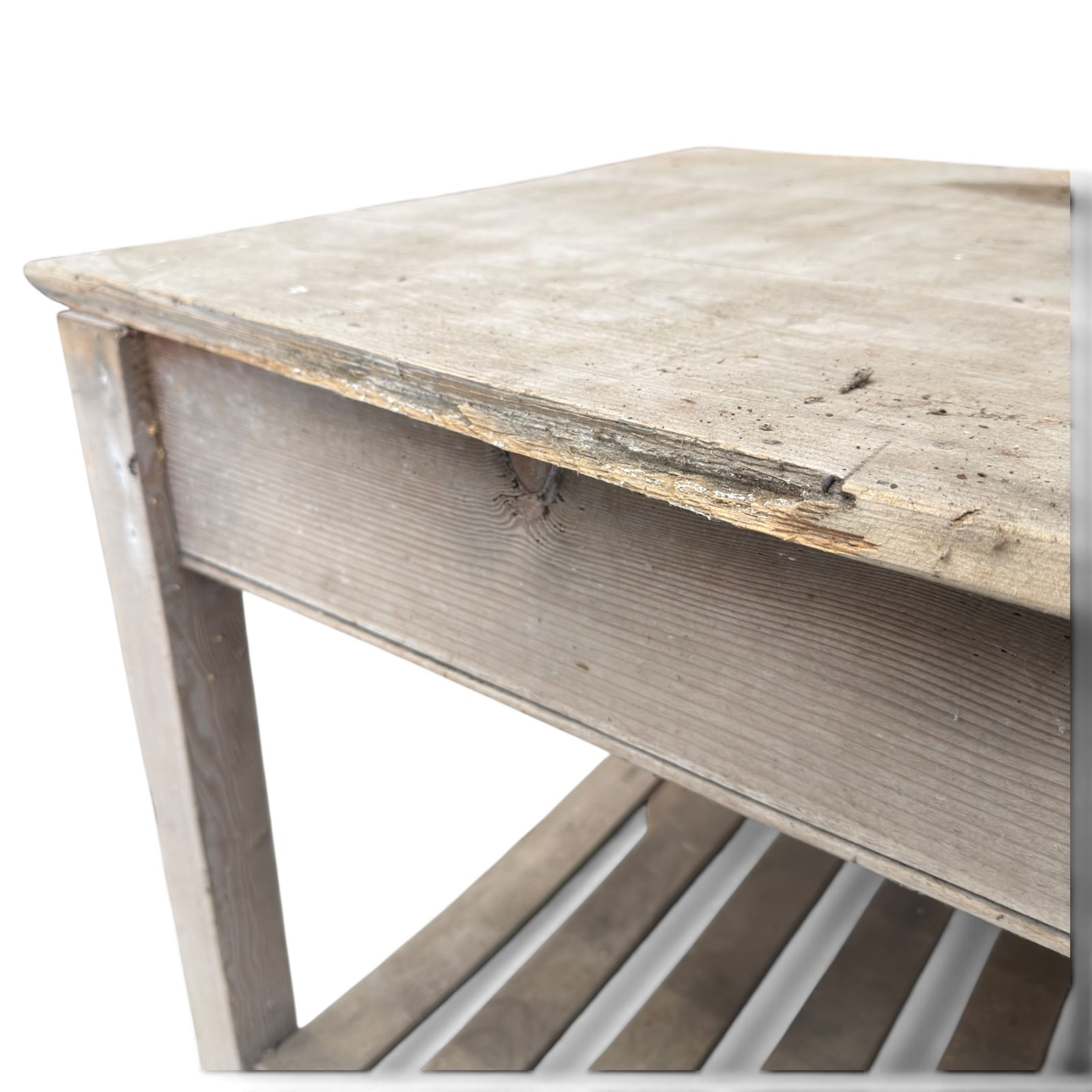Large 19th century painted pitch pine scullery table, rectangular triple plank top fitted with single drawer, raised on square supports united by slatted under-tier