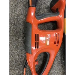 Flymo EasiCut 600 XT hedge cutter, a strimmer and a Ryobi RPT400 pole hedge trimmer